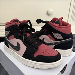 Air Jordan Black and Pink High-Top Sneakers
